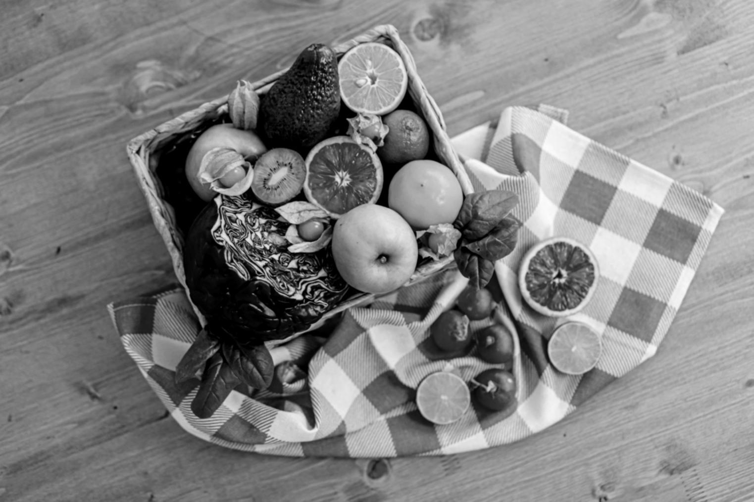Traditional cooking ingredients and spices arranged on wooden surface